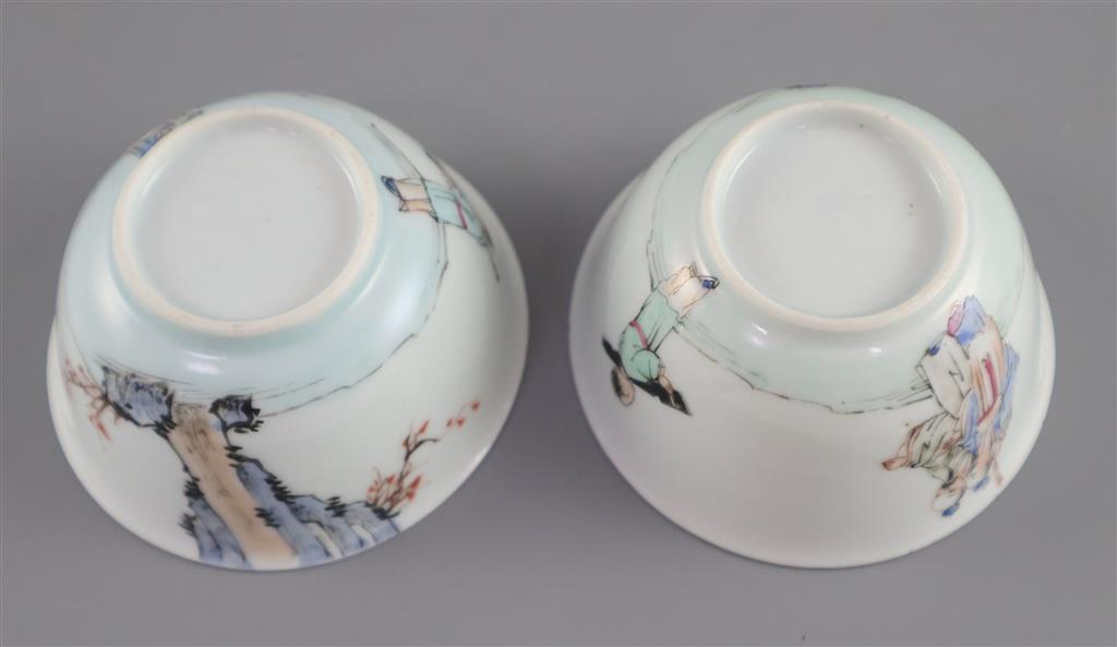 A pair of Chinese famille rose sages tea bowls and saucers, Qianlong period, saucers 11.7cm diameter